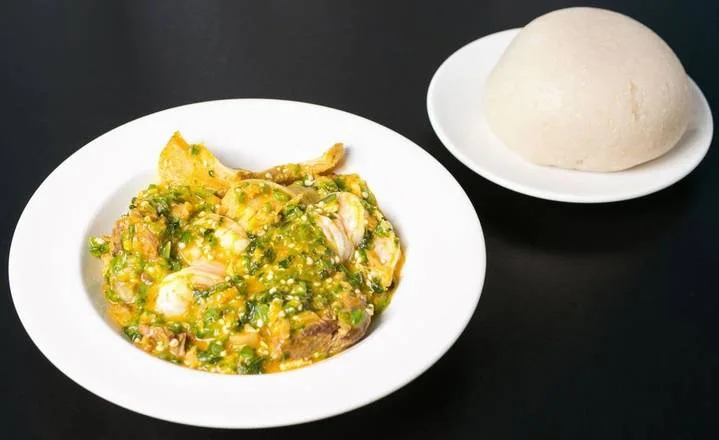 Fufu with rich West African soup - Fufu and Egusi Soup at Global Pot Fusion Cuisine in Winnipeg, MB